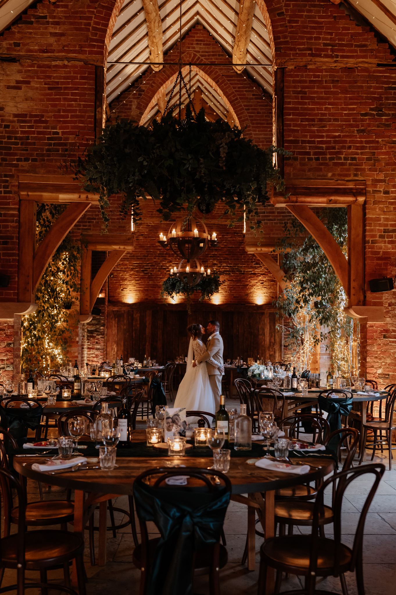 Bride and groom inside Shustoke Barn during their room reveal moment